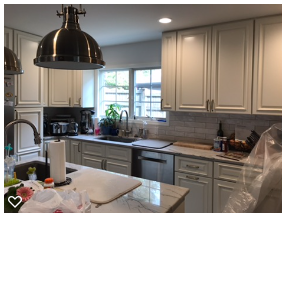 White kitchen with pendant lighting